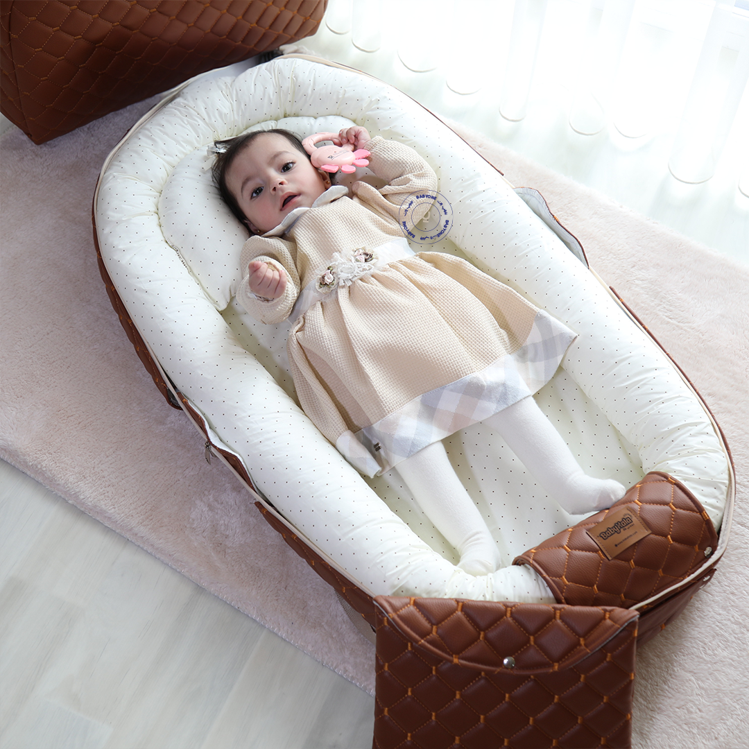 "الحضن المتنقل "المهد المحمول