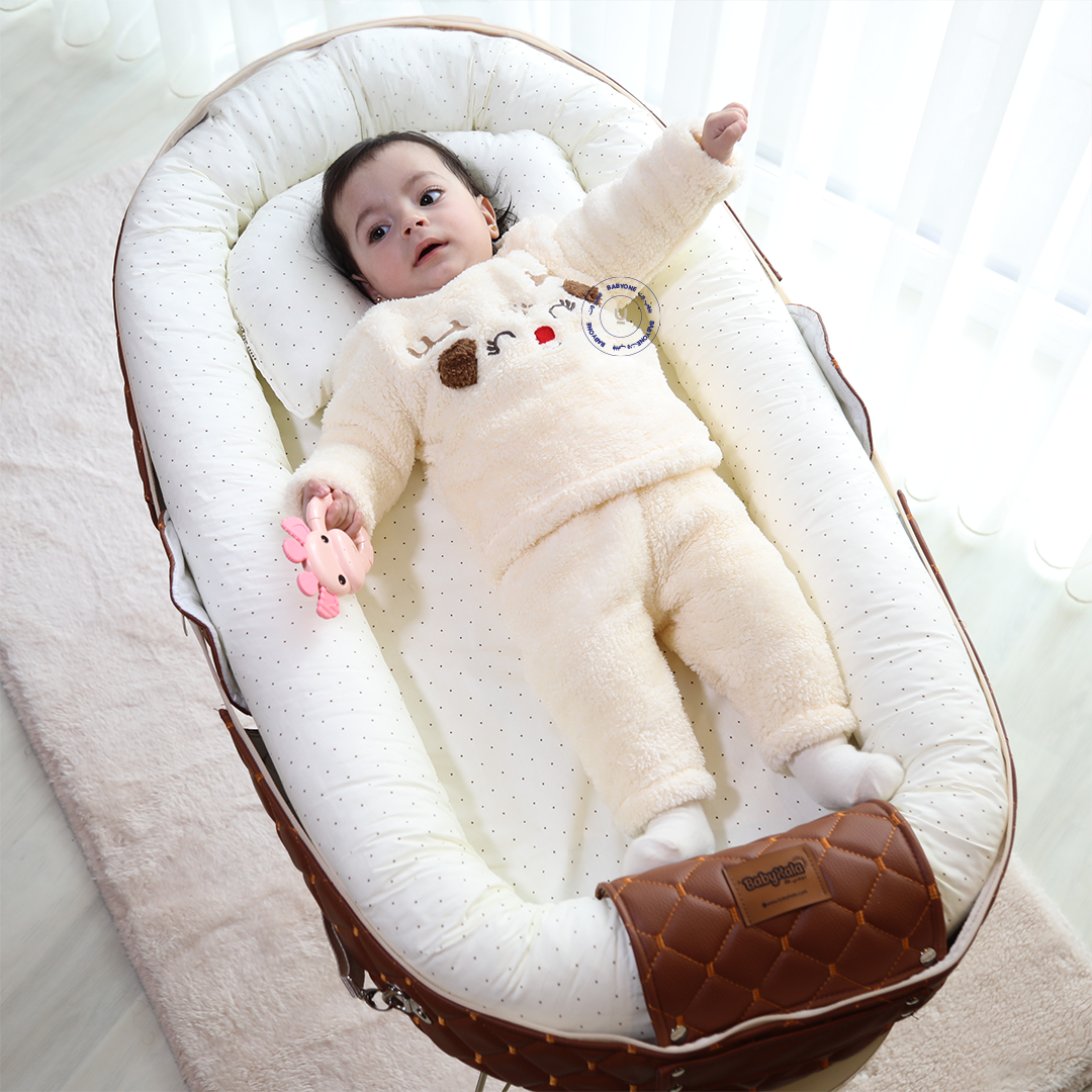 "الحضن المتنقل "المهد المحمول