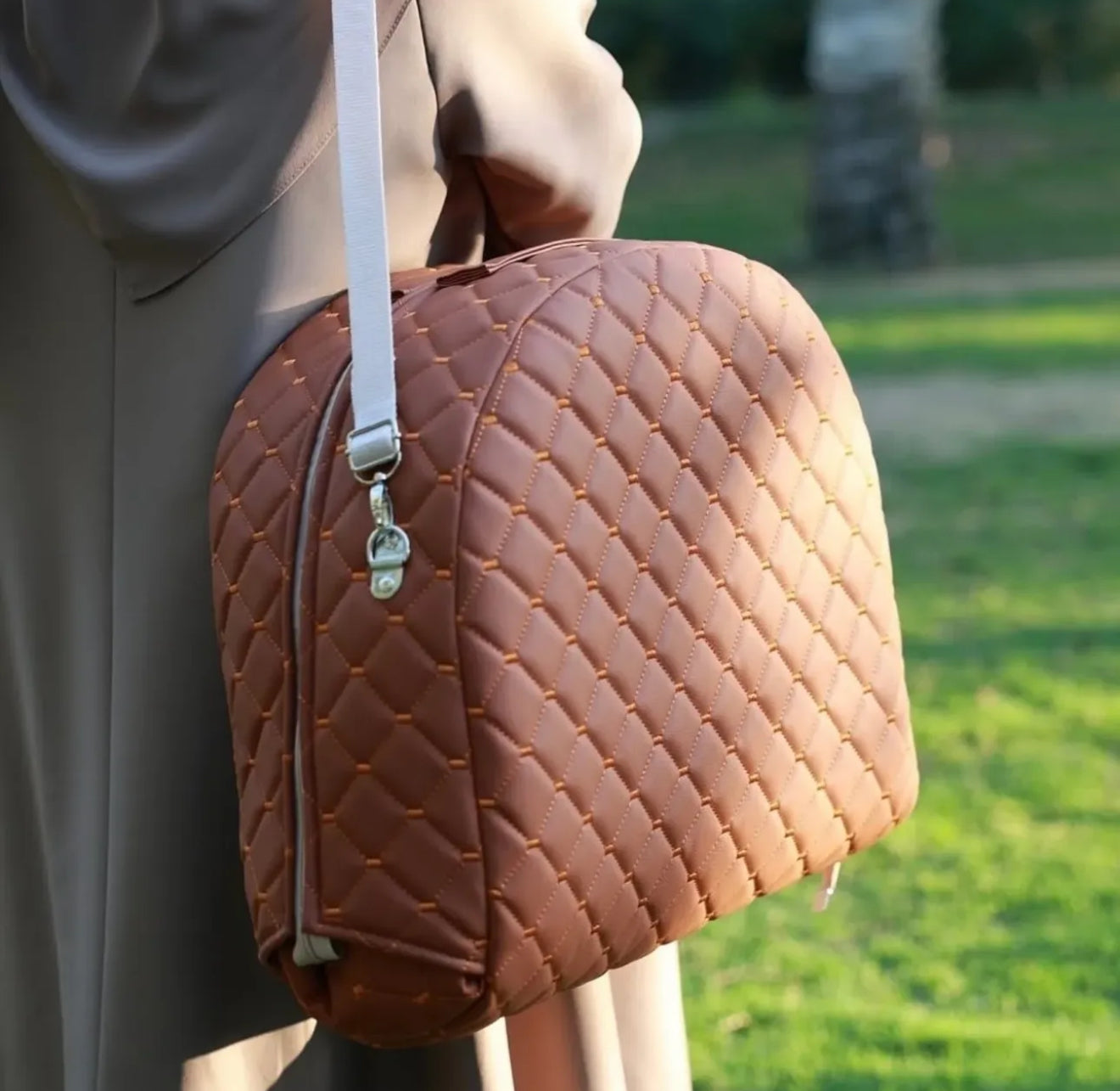 "الحضن المتنقل "المهد المحمول