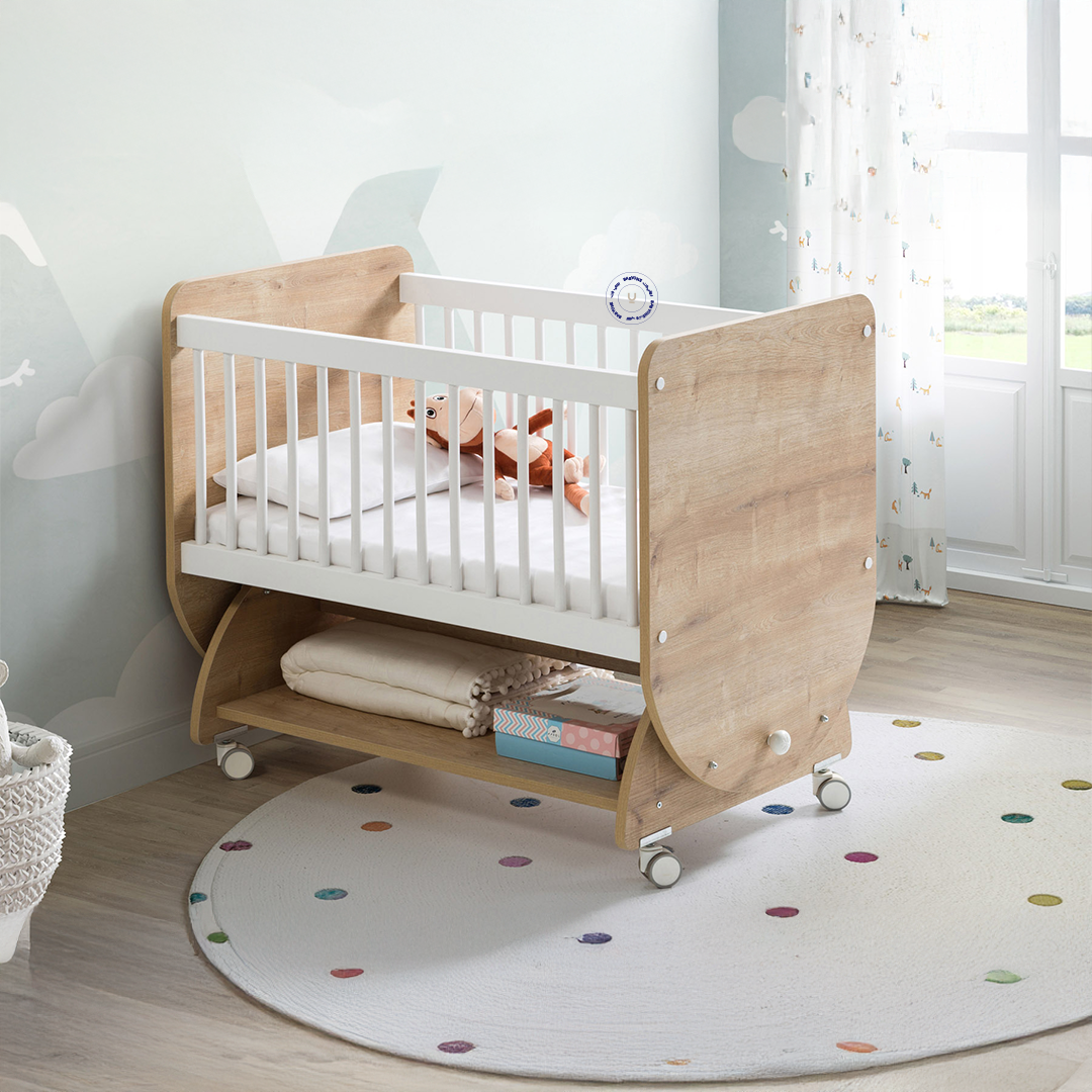 مهد هزّ مع عجلات ورفّ سفلي (65×90) (أبيض)