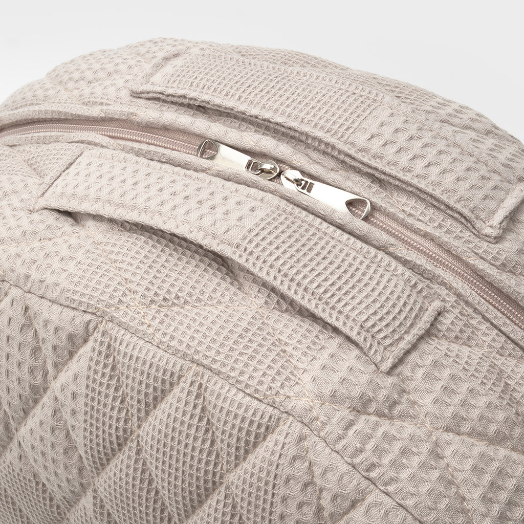 BabyOne portable crib with soft padding and cozy canopy for infants, designed as a mobile bed for comfort and safety.