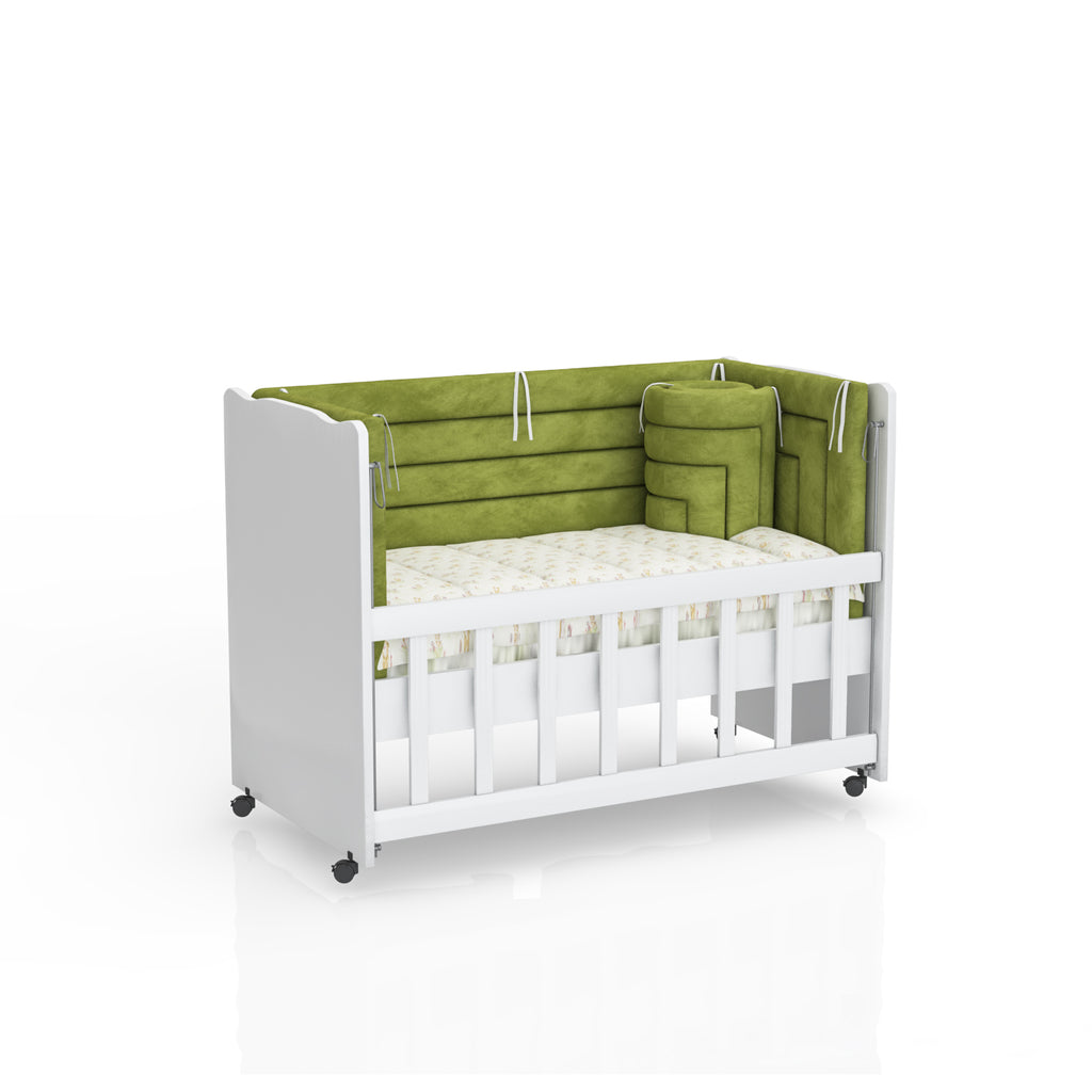 White Niero crib by BabyOne for children up to 3 years old, shown with a mattress and bedding in a nursery setting.