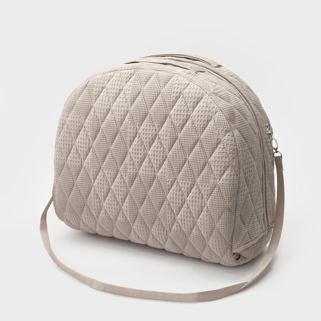 BabyOne portable crib with soft loungewear and sugar, featuring a cozy, mobile baby bed for comfortable naps.