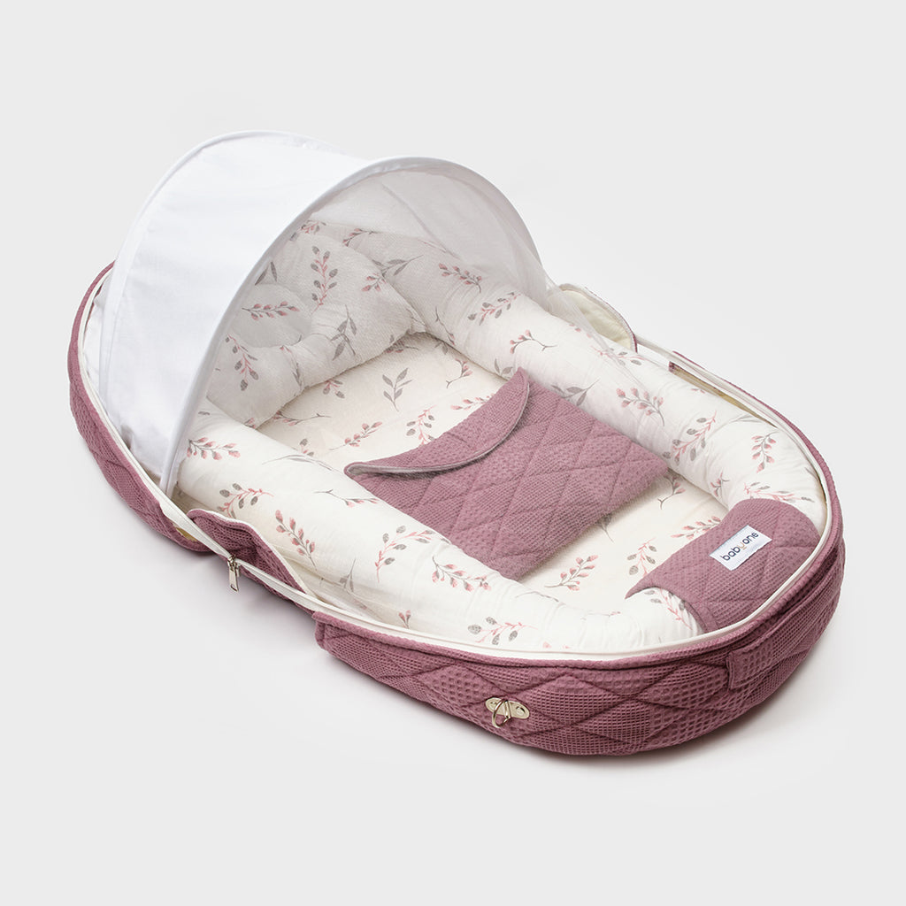 BabyOne portable baby cradle "Al-Hadn Al-Mutanqal" in soft fabric with sturdy frame for easy mobility and comfort.