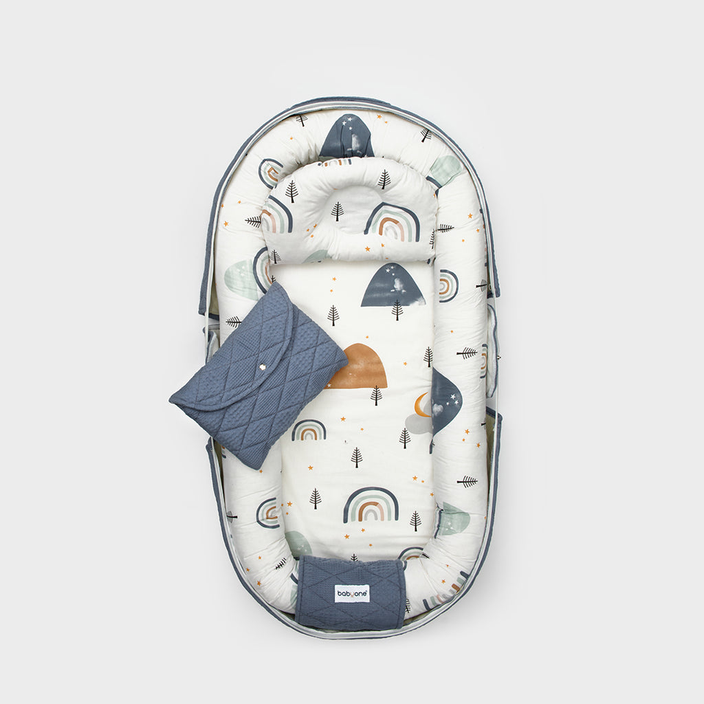 BabyOne Tom and Jerry "Portable Cradle" baby bed with soft fabric, supportive sides, and playful Tom and Jerry design for infants.