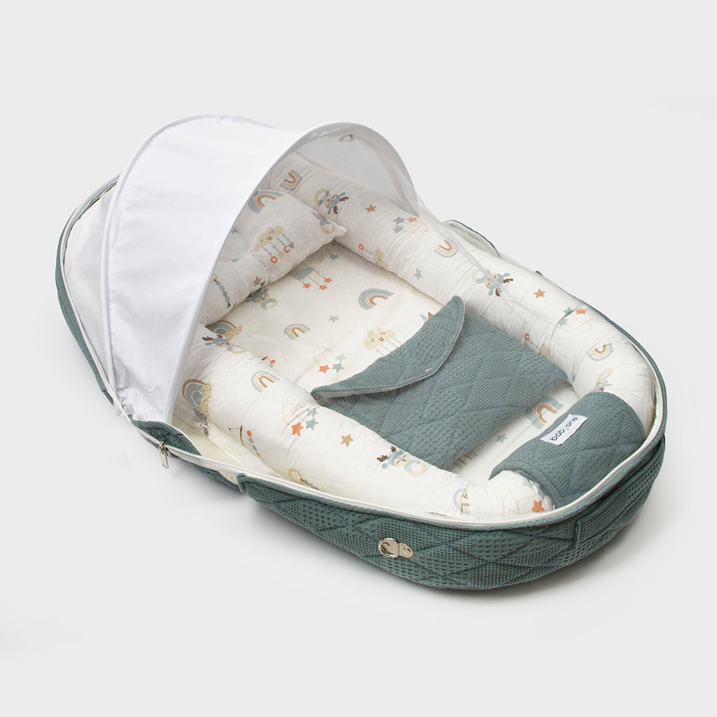 BabyOne Mario Portable Cradle, a lightweight mobile baby bed with cozy fabric and safety features, ideal for on-the-go comfort.