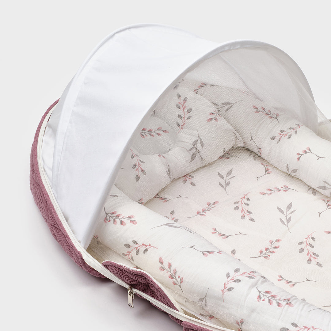BabyOne portable baby cradle "Al-Hadn Al-Motenqal" mobile crib with soft bedding and sturdy frame, suitable for infants.