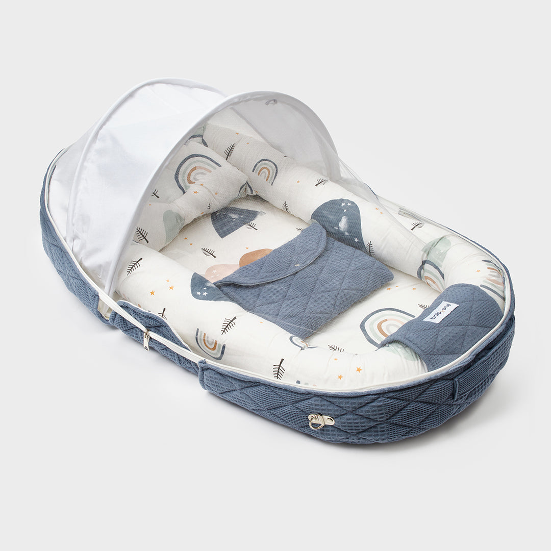BabyOne Tom and Jerry portable cradle, soft fabric baby bed with colorful cartoon character design for infants.