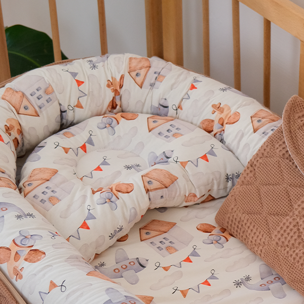 "الحضن المتنقل "المهد المحمول مع ناموسية ووسادة ارجاع